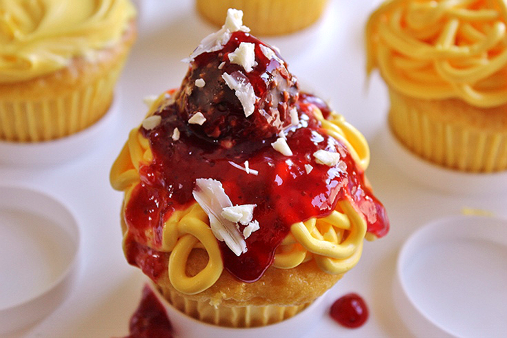 These Spaghetti and Meatballs Cupcakes would make the perfect family dessert prank or Lady And The Tramp party treat! Use Strawberry Jam for the sauce, Ferrero Rocher chocolates for the meatballs, and shaved White Chocolate for the parmesean cheese.