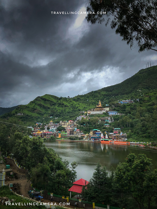 Above photograph is clicked from Gurudwara at Rewalsar and offers a view of Rewalsar Lake. And on the top of the hill you can easily see this huge statue of Padamsambhava.  Rewalsar lake is in Mandi district of Himachal Pradesh. Mandi town comes on the way when you go to Kull/Manali from Chandigarh or Delhi.   Like many other places, Rewalsar is approachable through road. Nearest Railway station is Una and nearest airport is in Bhutar/Kullu. For road trip to Rewalsar, Google Map is best to follow than we sharing details, but keep in mind that it's a little away from main highway which connects Delhi with Mandi.  Lot of people come to Rewalsar from Mandi town, which means they stay around Mandi town and plan a day trip to Rewalsar.    This  statue of Padmasambhava at Rewalsar is 12 meter high and also known as Guru Rinpoche, which was installed in 2012 by Dalai Lama. When my niece looked closely at the statue, her question was - "Why Padamsambhava is sitting with 'yo 🤟' pose?". I couldn't the question well and then she asked me to look at the hands of Padamshambhava and then I realised what she means :).