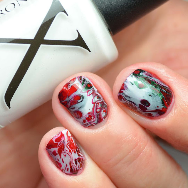 fluid art nail polish created with christmas colors