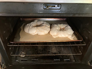 pavlova wreaths in an open oven