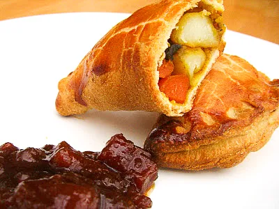Curried vegetable pasty served with chutney.