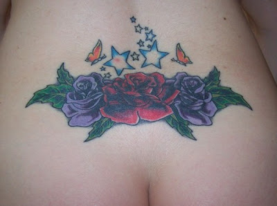 Japanese Flower and Star Tattoo Design on Back Girl