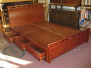 SOLDQueen Captain's Bed$160. Includes three drawers on each side.