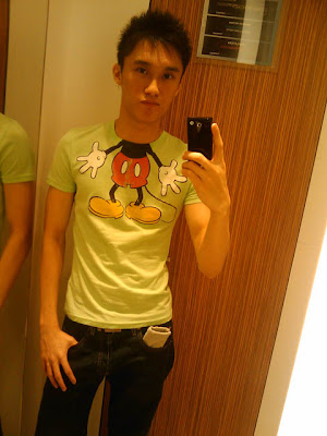 trying the mickey mouse t-shirt