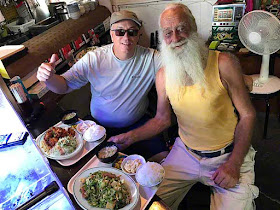 Thomas Corrao and Ryukyu Mike at a restaurant