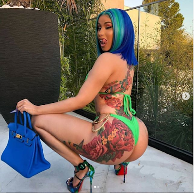 image result for cardi b new tattoo