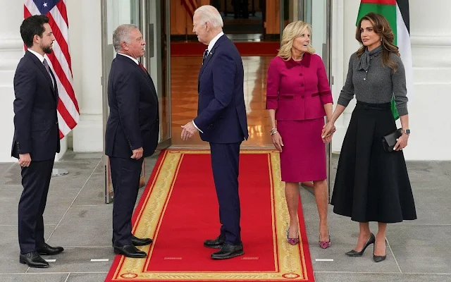 Queen Rania wore a grey cashmere sweater by Christian Dior, First Lady Jill Biden wore a fuchsia jacket suit by Chanel