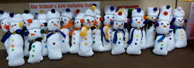 http://tunstalltimes.blogspot.com/2011/12/sock-snowman-gift-and-merry-christmas.html