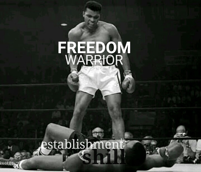 Muhammad Ali boxer winning fight standing triumphant angry