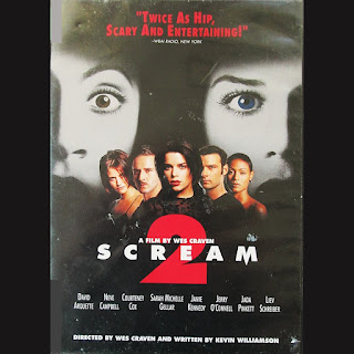 DVD cover for the movie Scream 2. Two frightened women in black and white in the background. Five cast members group together in the foreground.