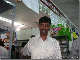 CBF Day 13 Photo 31 Stall No 372 getting his own copy of CBS gives him the joy