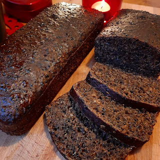 A picture of two archipelago bread loaves. The one on the right side is partially sliced.