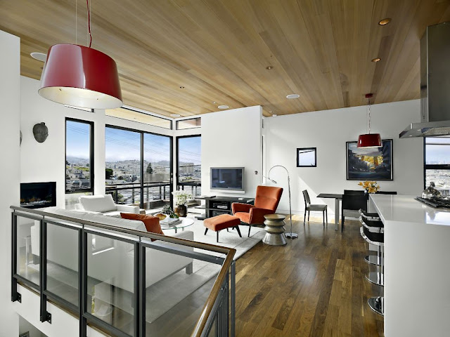 Warm modern living room on third floor with wooden ceiling 