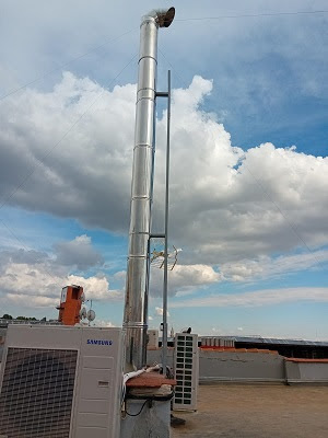 Alargar-tubos-chimenea-optimizar-proceso-cumplir-normativa-Madrid