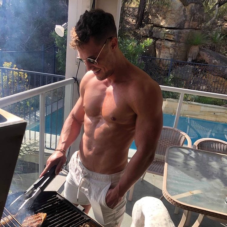 hot-shirtless-muscular-guy-in-shape-grilling-meat-outdoor-daddy-naughty-smile