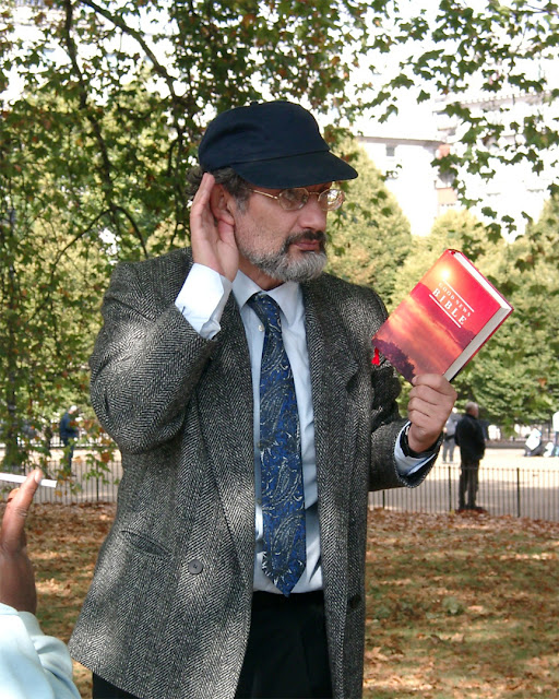 Orator with a copy of the Good News Bible, Speakers' Corner, Hyde Park, London