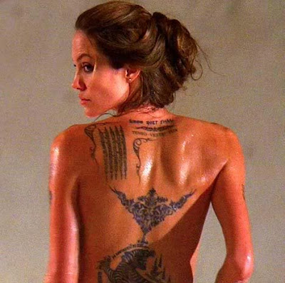  on her left shoulder amoung several other unique tattoo artworks