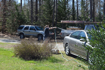 Sarah washing our car.