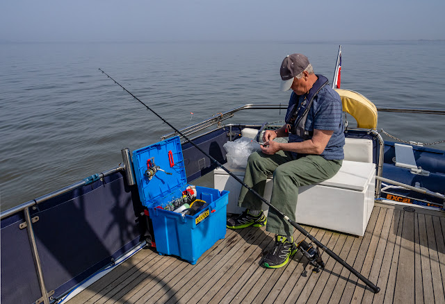 Photo of Phil setting up one of his fishing rods