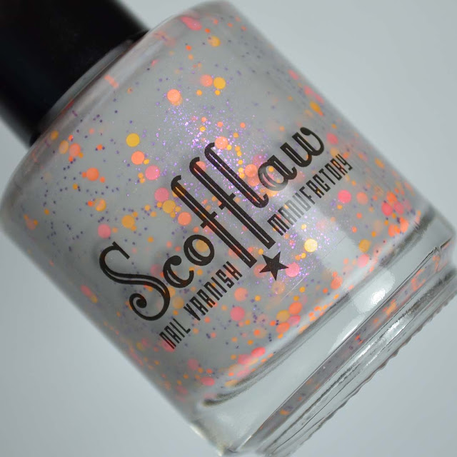 grey crelly nail polish with glitter