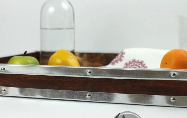 Adding Metal trim to wood with upholstry tacks
