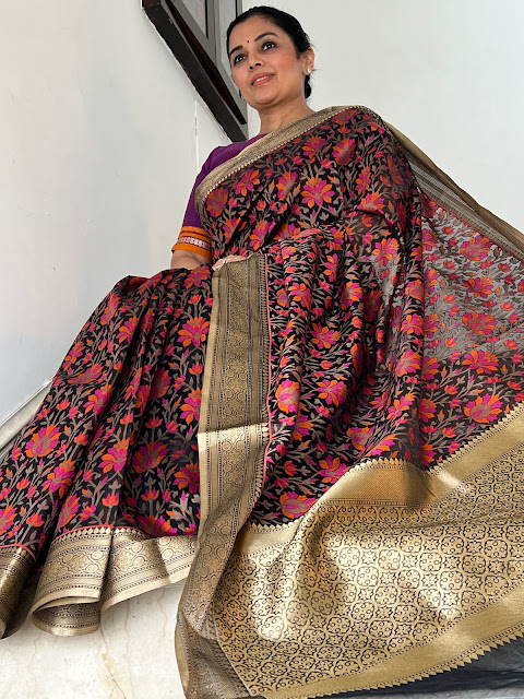 Black Banarasi kota saree with a floral iaal