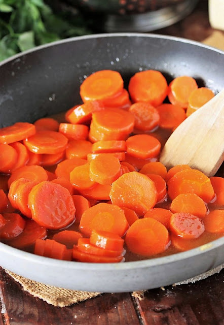 Honey Glazed Carrots in Saucepan Image