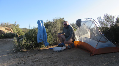 Adam in front of tent on end of day 2