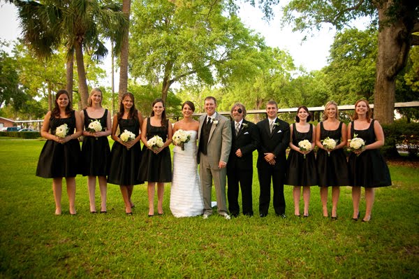 Their bridesmaids wore the Alfred Sung scoopneck dress D447 in black 