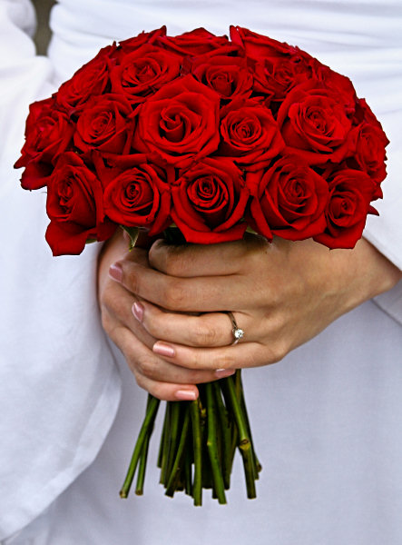 a simple bridal bouquet of red roses