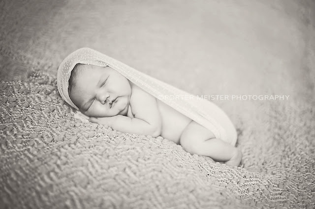 photo of newborn in wrap