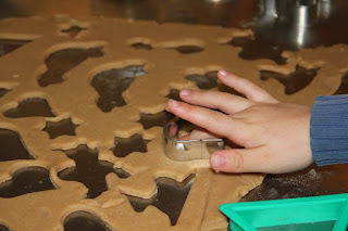 Cutting out cookies in cookie dough