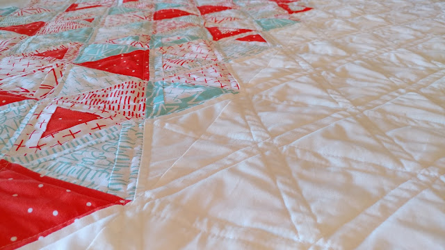 Rough Around the Edges equilateral triangle quilt by Slice of Pi Quilts