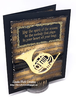 Linda Vich Creates: Rustic Musical Season. Sheet music, distressing and a gold instrument combine to create this vintage Christmas card.