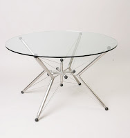 Clean and modern v-star tensegrity glass table