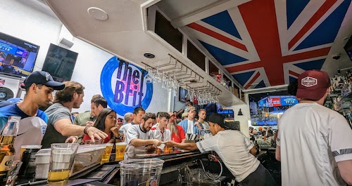 The full bar in motion with mostly English fans