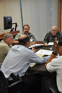 Law enforcement officers examine eyewitness identification procedures at a LEMIT training.
