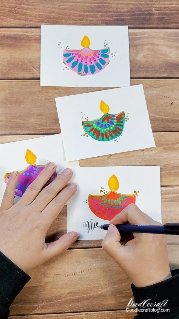 Finish off the cards with a little calligraphy or hand lettering!   Write on a little "Happy Diwali" and send cards to family and friends!