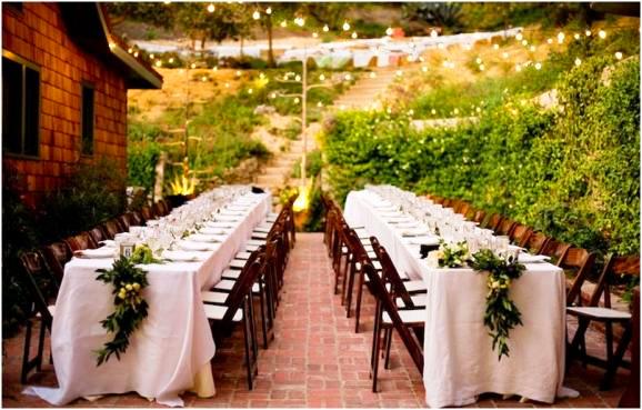 teal and brown table settings for a wedding