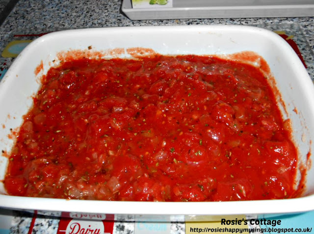 Mix your tomatoes, onion, garlic & Italian herbs to create a base for your chicken.