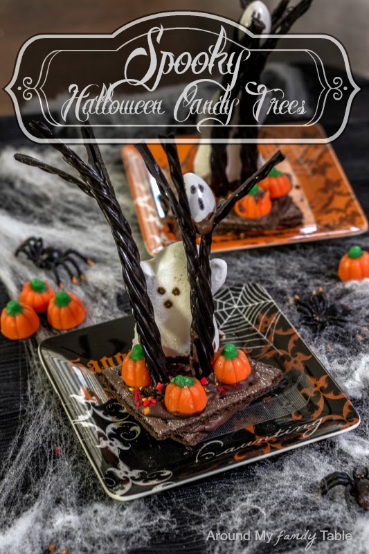 http://www.aroundmyfamilytable.com/2013/10/spooky-halloween-candy-trees/