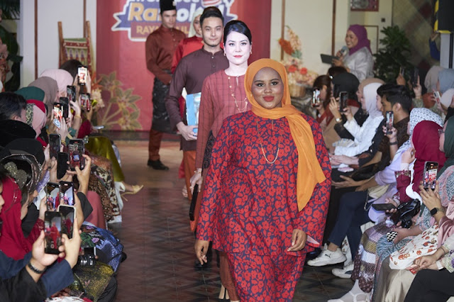 Models headlined by body positivity model Hikma Al Hassan showcased the second look - the Burnt Orange trend