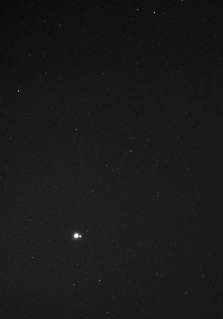 pictures of mercury from earth. From Mercury, the Earth almost looks as if it is a binary system.