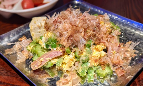 Goya chanpuru (sauteed bittermelon, spam, egg tofu)