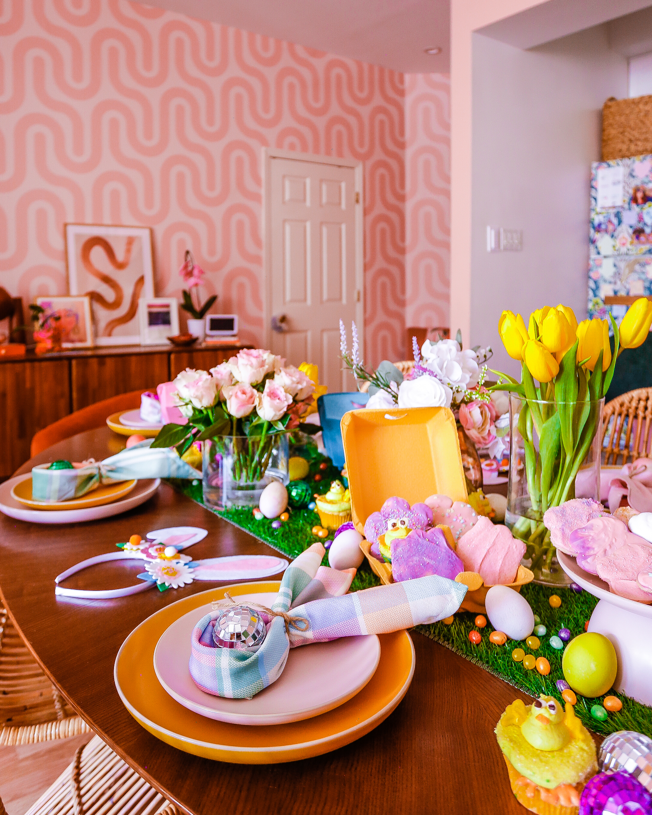 bunny shaped napkins // easter tablescape // yellow baby chick cupcakes // colorful easter decor // easy easter tables cape // easy easter decor // easter decor ideas // easter decor inspo // easter treat ideas // easy easter dessert ideas // flower sugar cookie recipes // baby chick cupcakes recipe // easter treat ideas // easter tablescape inspo // easter tablescape ideas // easter decor for kids // colorful easter decor ideas