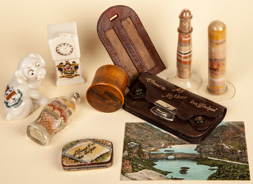 Various trinkets and souvenirs from holidays in the past