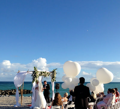  Dania beach wedding ceremony with bamboo gazebo, white folding chair 