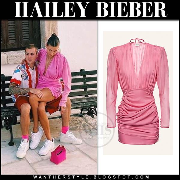 Hailey Bieber in pink Magda Butrym mini dress and white sneakers