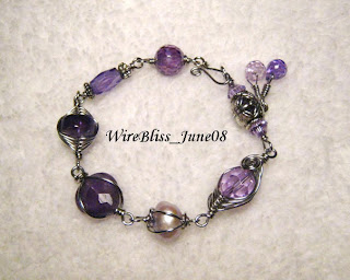 Wire wrapped purple themed Bracelets