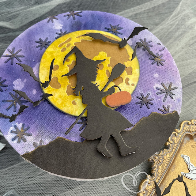 Mixed media canvas created with Tim Holtz Sizzix Halloween Night and Moonlight dies plus Distress sprays.